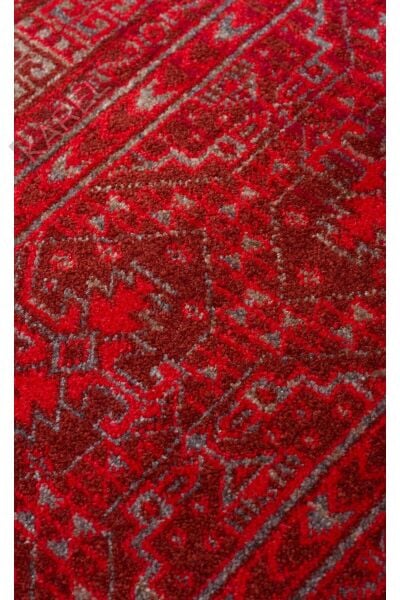 PIETRA PTA 17 RED Sıcak Renk Tonlarını Etnik Desenler ile Buluşturan Yumuşak Tuşeli Makine Halısı