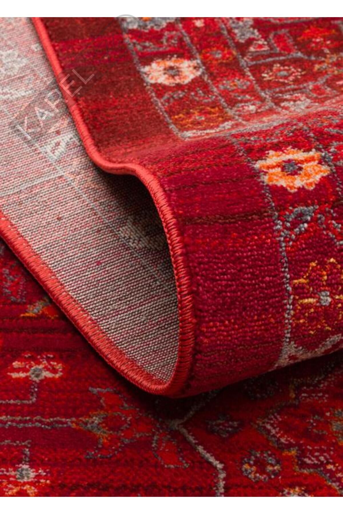 PIETRA PTA 21 RED Sıcak Renk Tonlarını Etnik Desenler ile Buluşturan Yumuşak Tuşeli Makine Halısı
