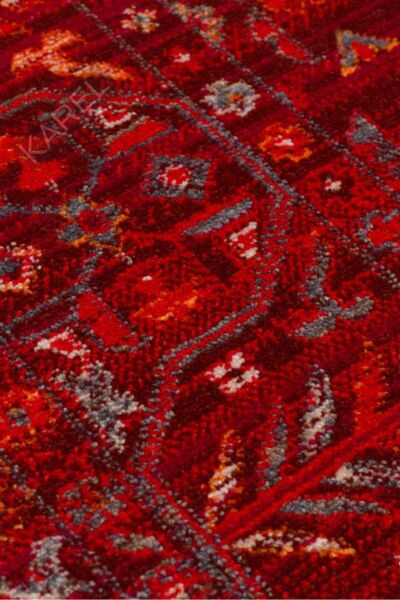 PIETRA PTA 21 RED Sıcak Renk Tonlarını Etnik Desenler ile Buluşturan Yumuşak Tuşeli Makine Halısı