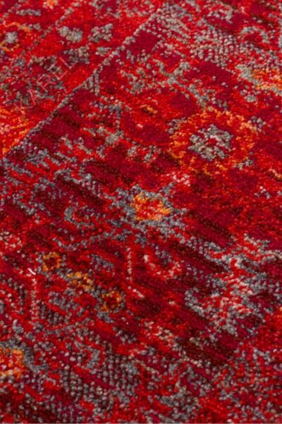 PIETRA PTA 20 RED Sıcak Renk Tonlarını Etnik Desenler ile Buluşturan Yumuşak Tuşeli Makine Halısı